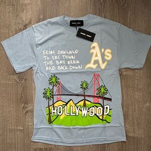 Homme Femme Hollywood/NY graphic tee in baby blue